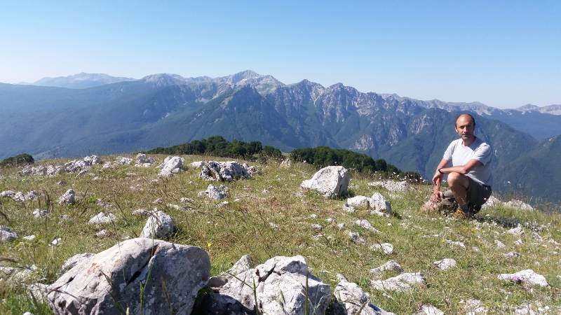 Gianluca on top of Mount Mattone with Camosciara and Mount Petroso group in the background.
